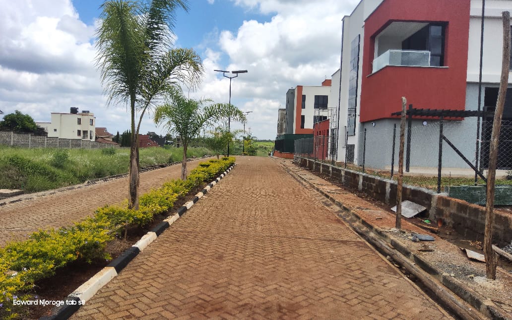 Delivered estate road with cabro paving and landscaping
