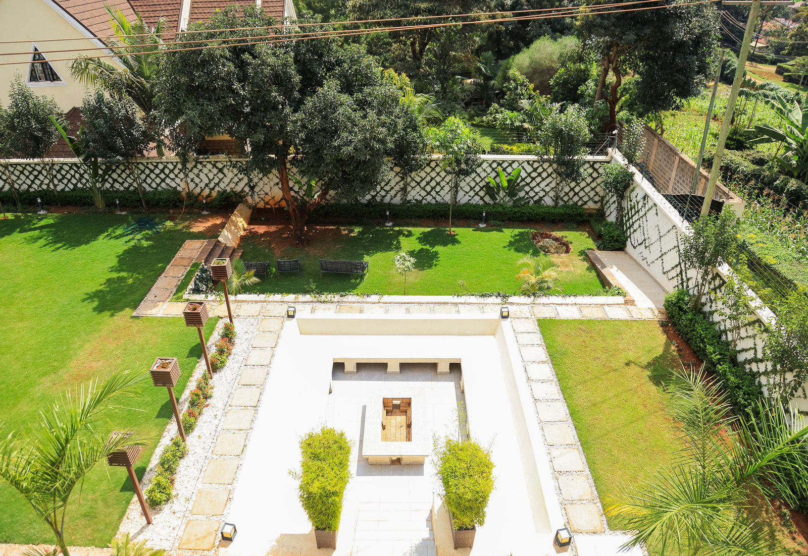 Terraced garden and sunken court of a delivered Msingi residence, Thome